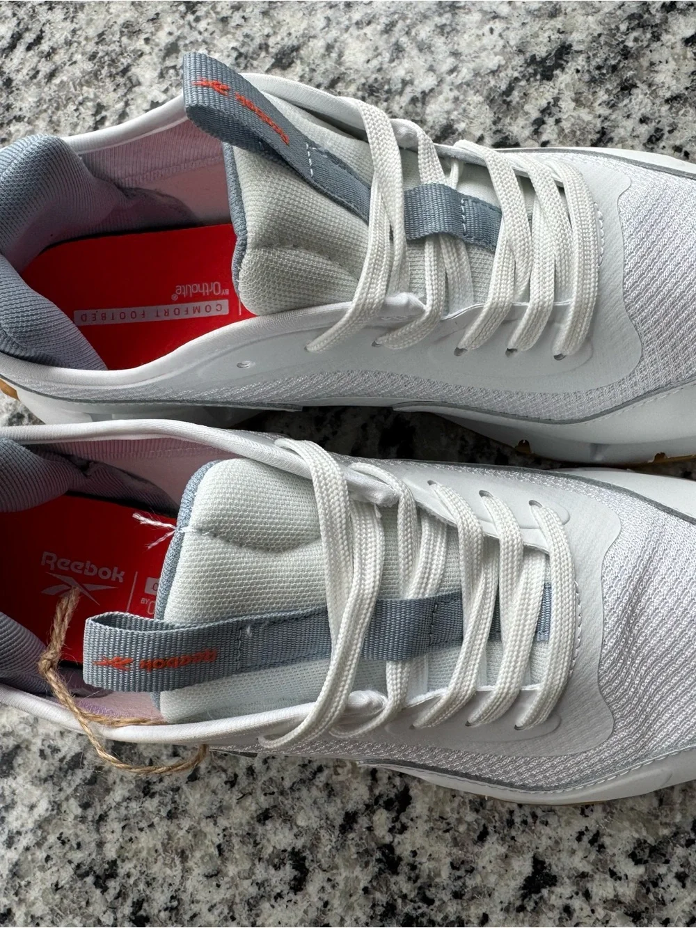 Reebok White and Gray Trail Runner with Orange Logo Accent